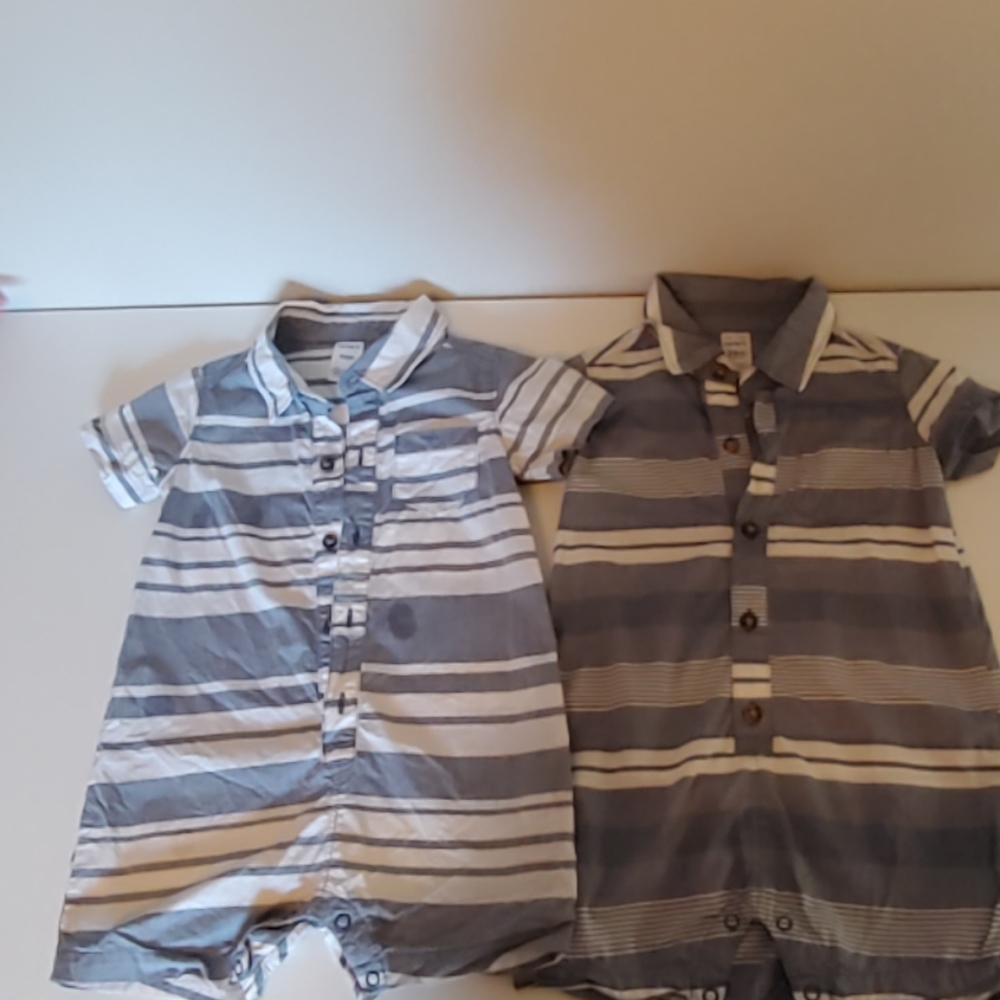 Two grey and white Carter's onesies